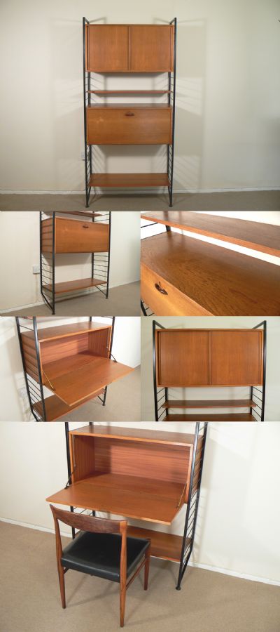 A small Ladderax wall system, c1960s. Designed by Robert Heal and manufactured by Staples, London. A compact system with pull down writing area. Can be arranged to suit your needs.