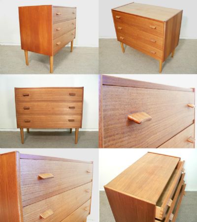 A small teak chest of draws. Danish, mid 1960s with lovely patinated teak wood and unusual angled handles.  Designed by Carl Aage Skov for Munch mobler, cica 1955.