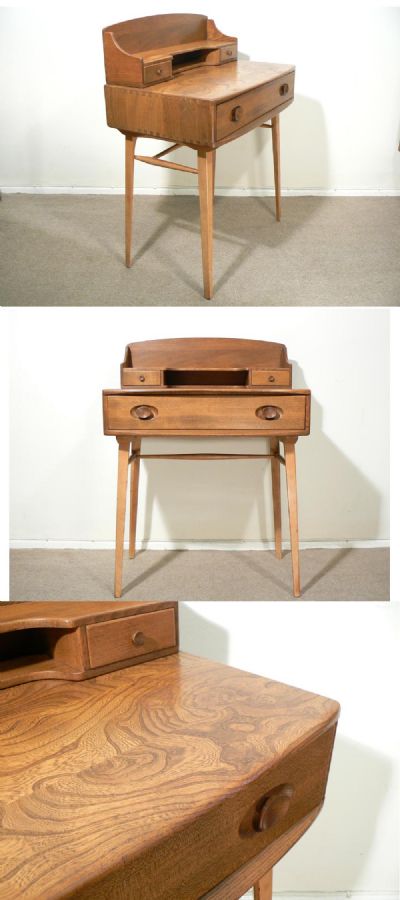 Ercol desk, c1970s. Solid elm with beech leg section and excellent figuring to grain.