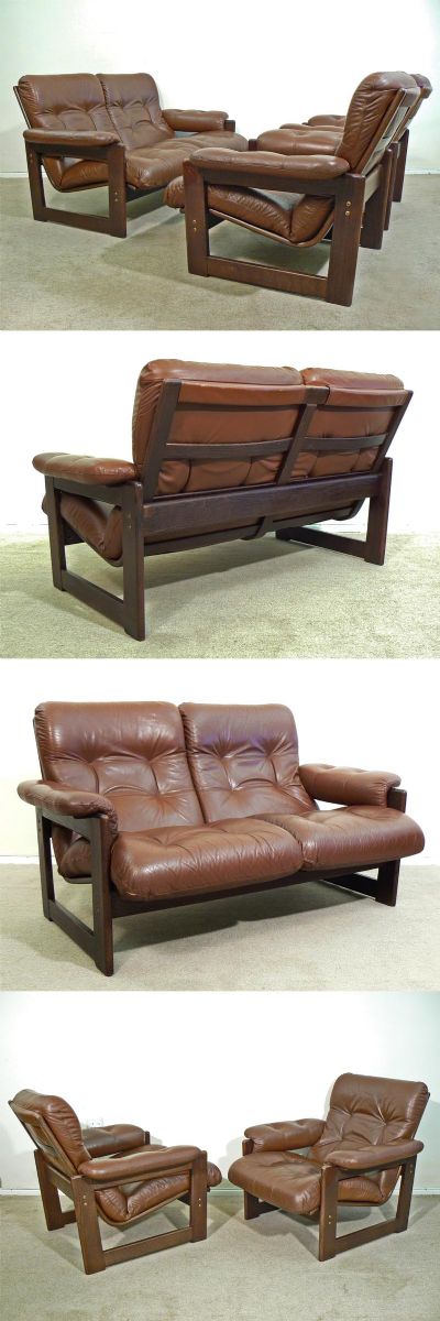 A two seater leather sofa and two armchairs, c1970s. Manufactured by Coja,of Denmark, (later North America). Stained oak frame with superb quality brown hide showing an excellent patina.