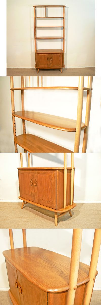 An Ercol room divider/bookcase, c1970. Made from solid elm with beech legs and side supports. Cupboard fitted with central narrow depth shelf.