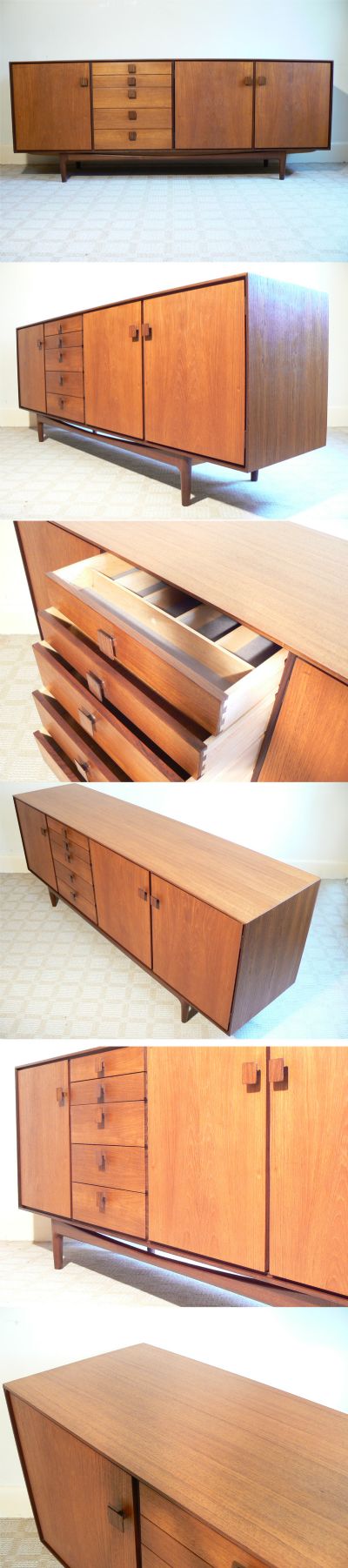 A large teak sideboard with rosewood handles, c1960s. Manufactured by G-Plan for their Danish inspired range, this piece was designed by IB Kofod Larsen.