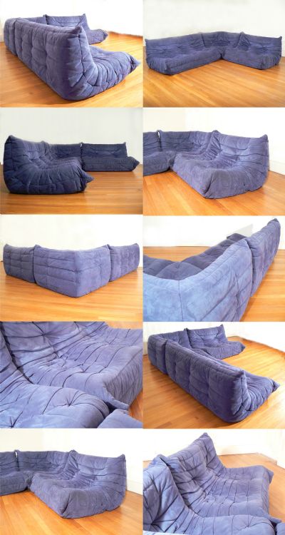 A Togo sofa system, c1990s. Originally designed by Michel Ducaroy in 1973, and manufactured by Ligne Roset . Consisting of one two seater, one three seater and one corner unit. Finished in blue Alcantara.