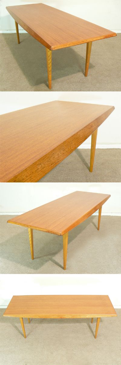 A Gordon Russell coffee table in teak with oak leg section, c1960s. 