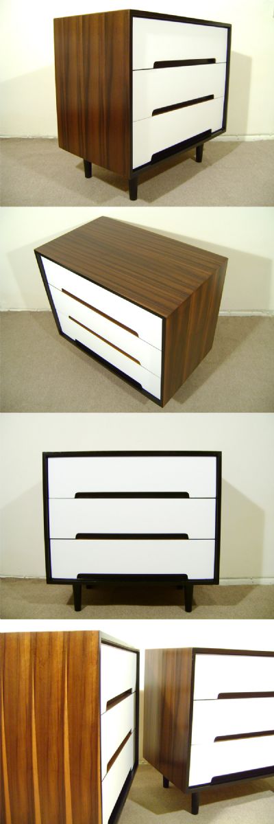 A 'C' range chest of drawers, c1960. Original white facings with walnut veneer, designed by John+Sylvia Reid for Stag furniture. Pair available. 