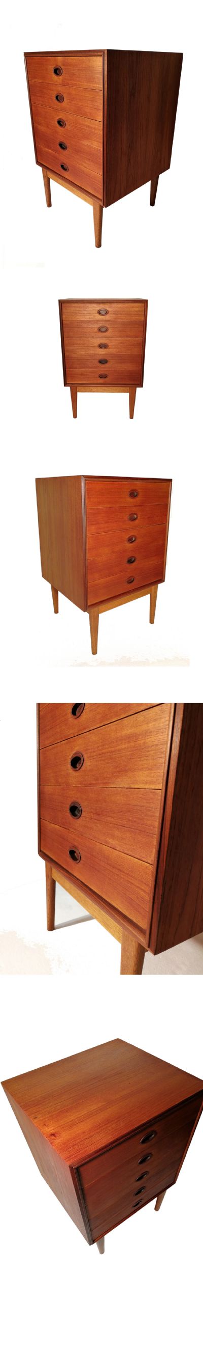 A small Danish chest of drawers c1960s. Constructed from teak and standing on an oak foot section.