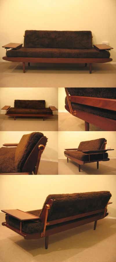Danish style day bed, in teak with metal fittings and extendable side tables. By Toothill Ltd, England